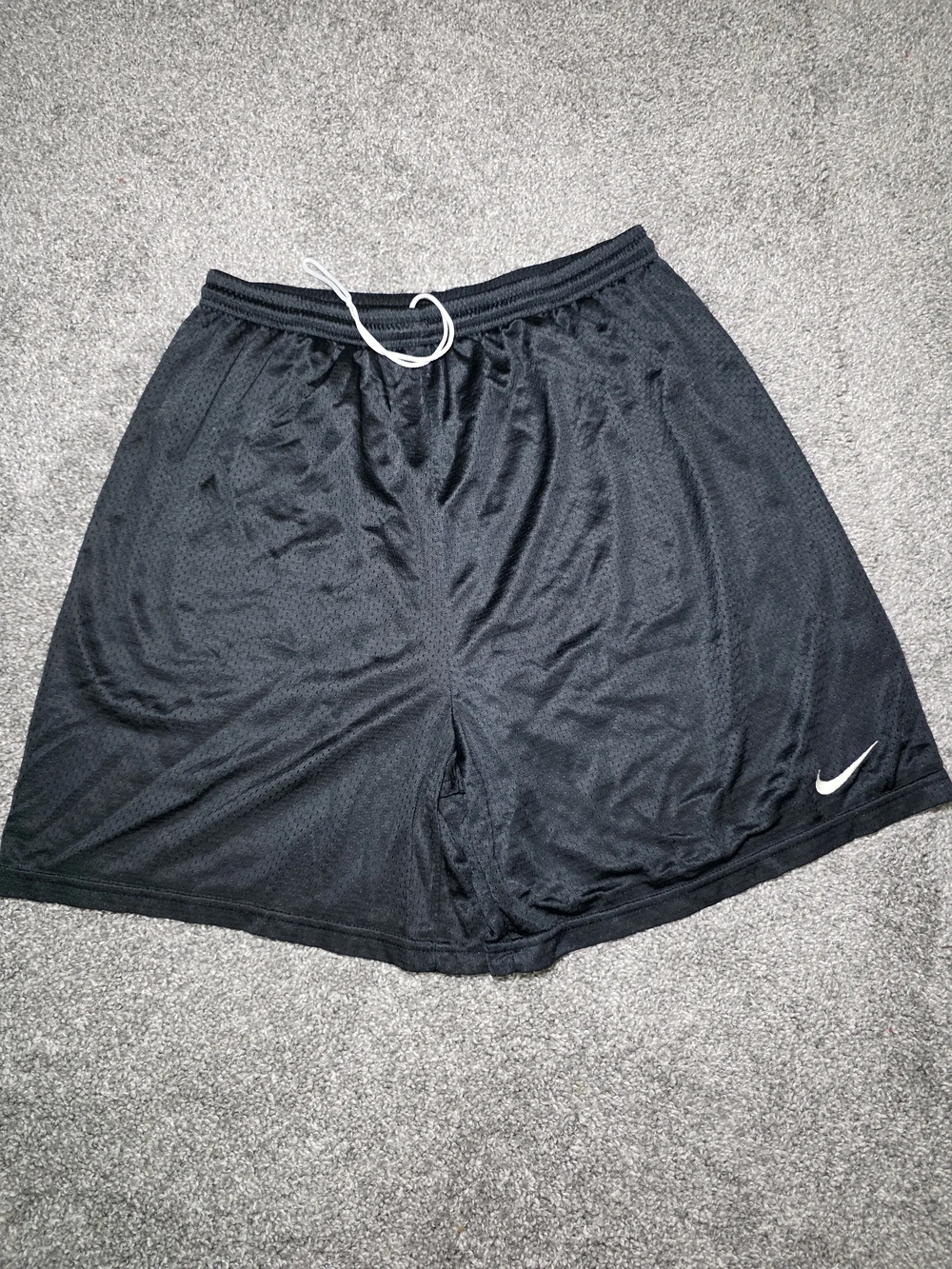 Nike Men’s Black Athletic Mesh Shorts with White Swoosh